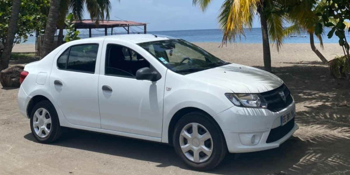 Dacia Logan CBG Location profil plage Martinique